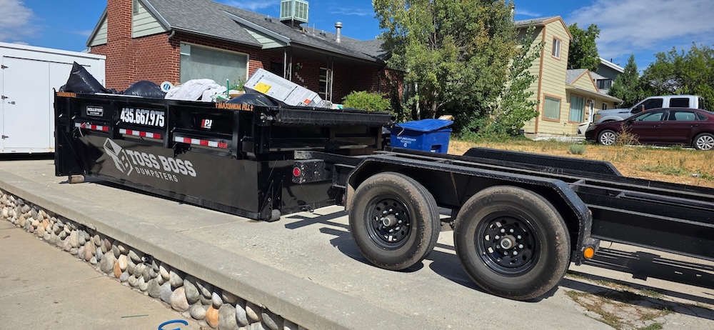 15-yard dumpster in residential driveway